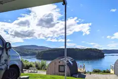 Hardstanding pitches (optional electric) with loch views Hardstanding pitches (optional electric) with loch views