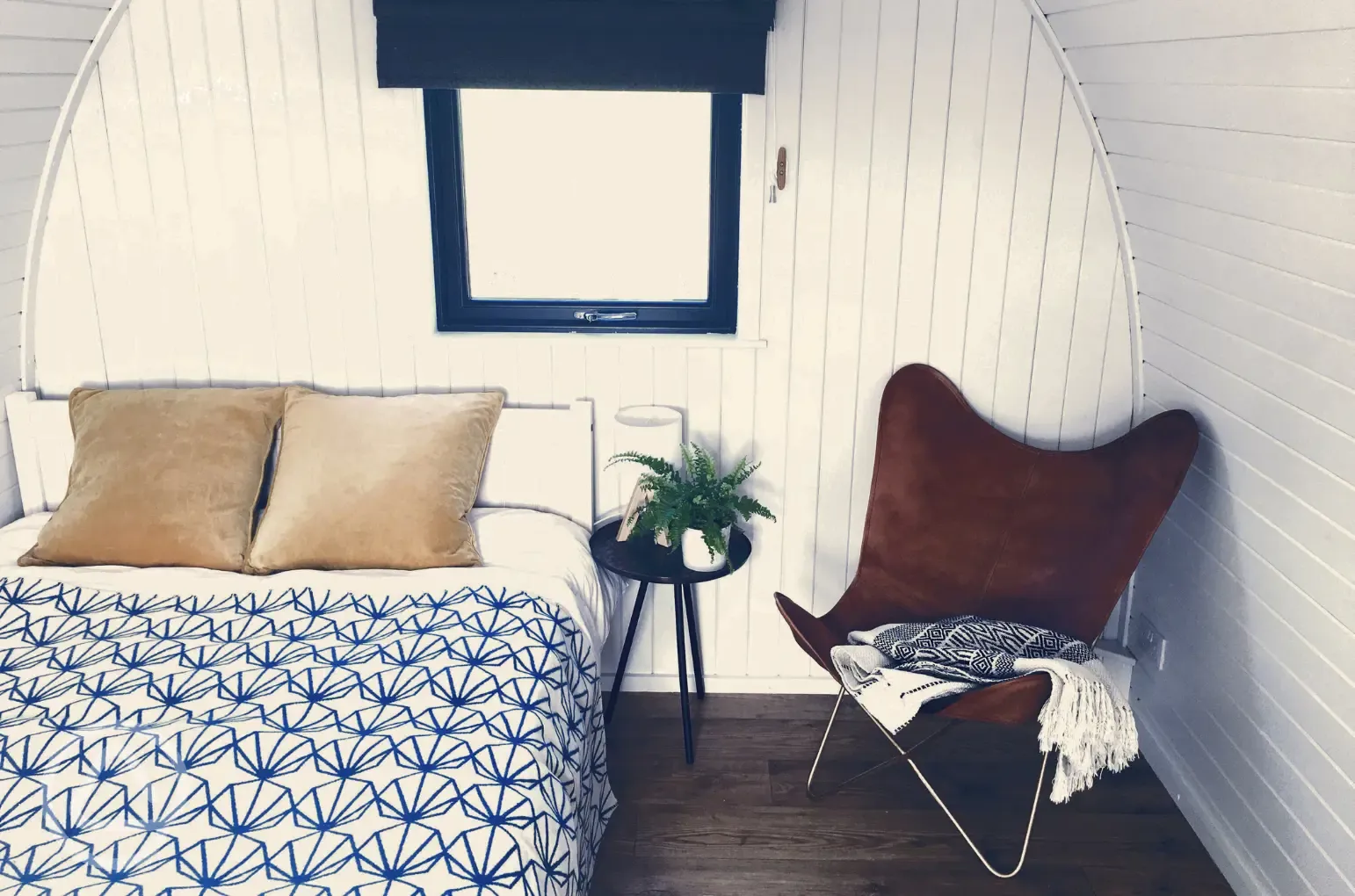 Sea Eagle glamping pod interior with a double bed Sea Eagle glamping pod interior with a double bed