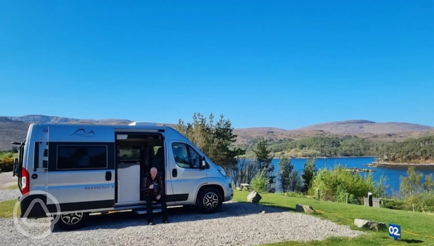 Hardstanding pitches (optional electric) with loch views Hardstanding pitches (optional electric) with loch views