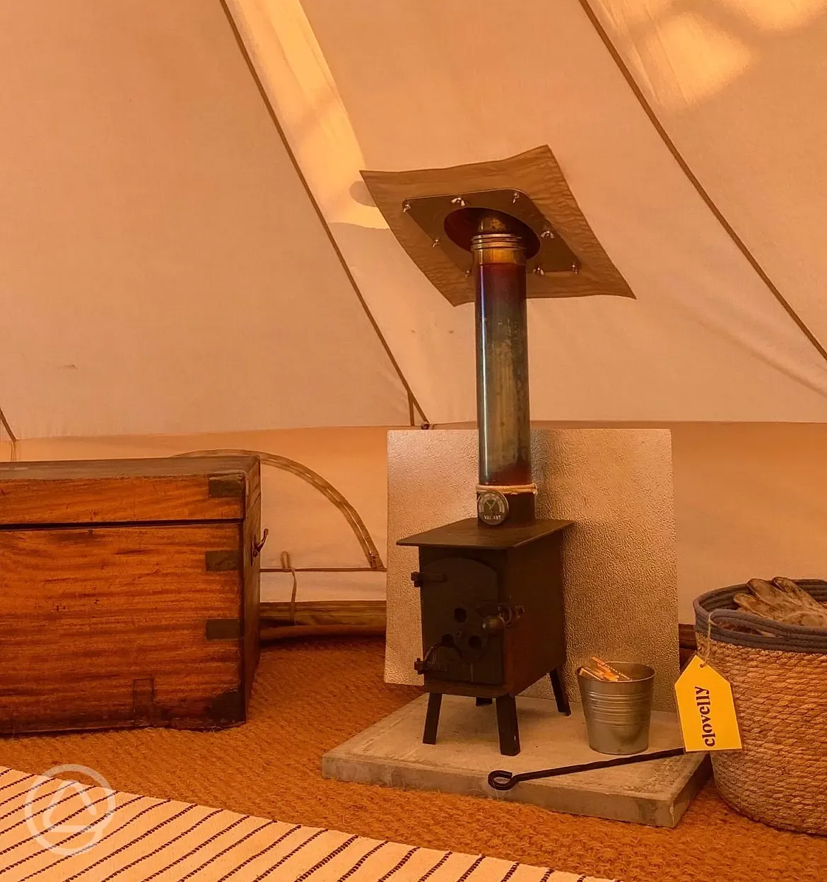 Luxury bell tent log burner