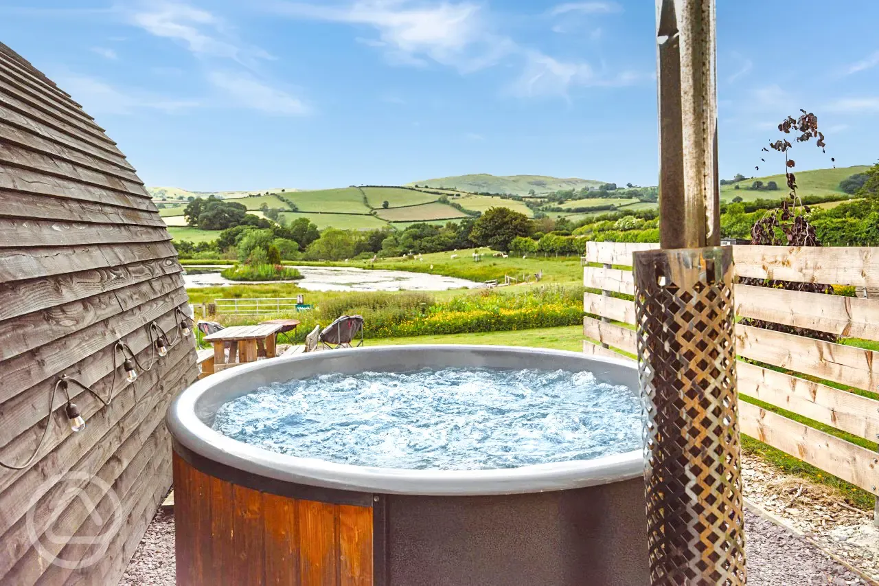 Ensuite deluxe Wigwam pod with a hot tub