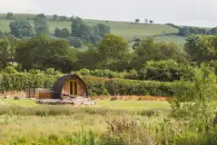 Ensuite deluxe Wigwam pod with a hot tub