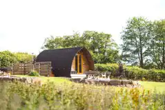 Ensuite deluxe Wigwam pod with a hot tub