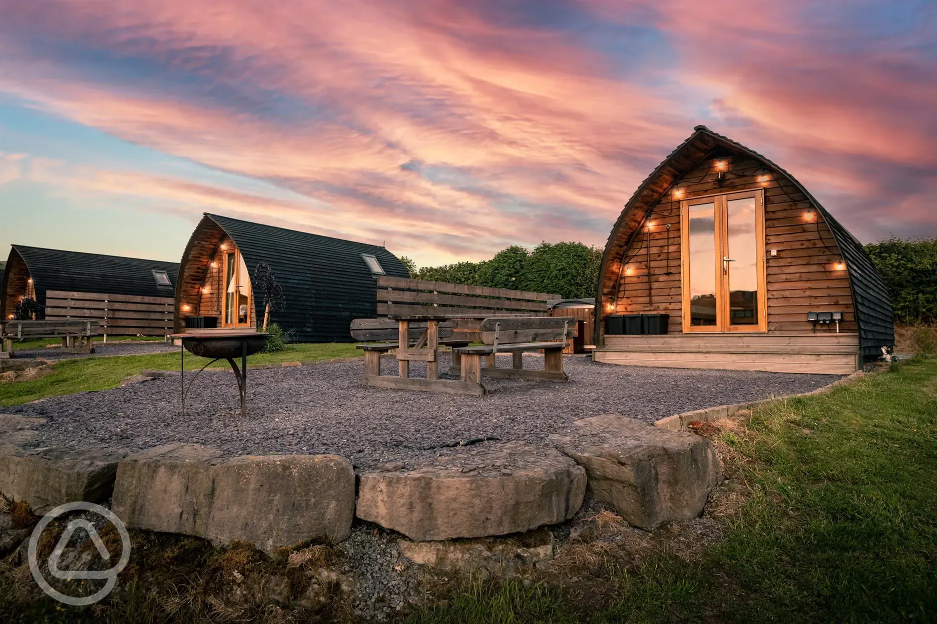 Ensuite Wigwam pods at night