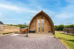 Ensuite deluxe Wigwam pod with a hot tub