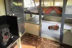 Saltings Landpod interior with beds (bedding available to hire) Saltings Landpod interior with beds (bedding available to hire)