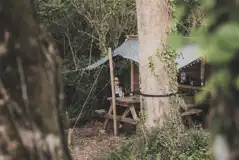 Private covered outdoor camping kitchen area