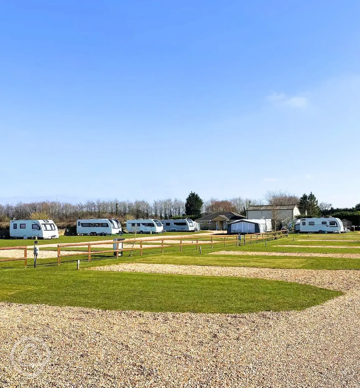 Hardstanding touring pitches with grass areas between