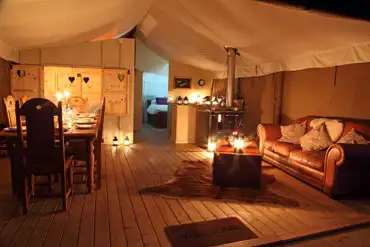 Safari tent interior at night