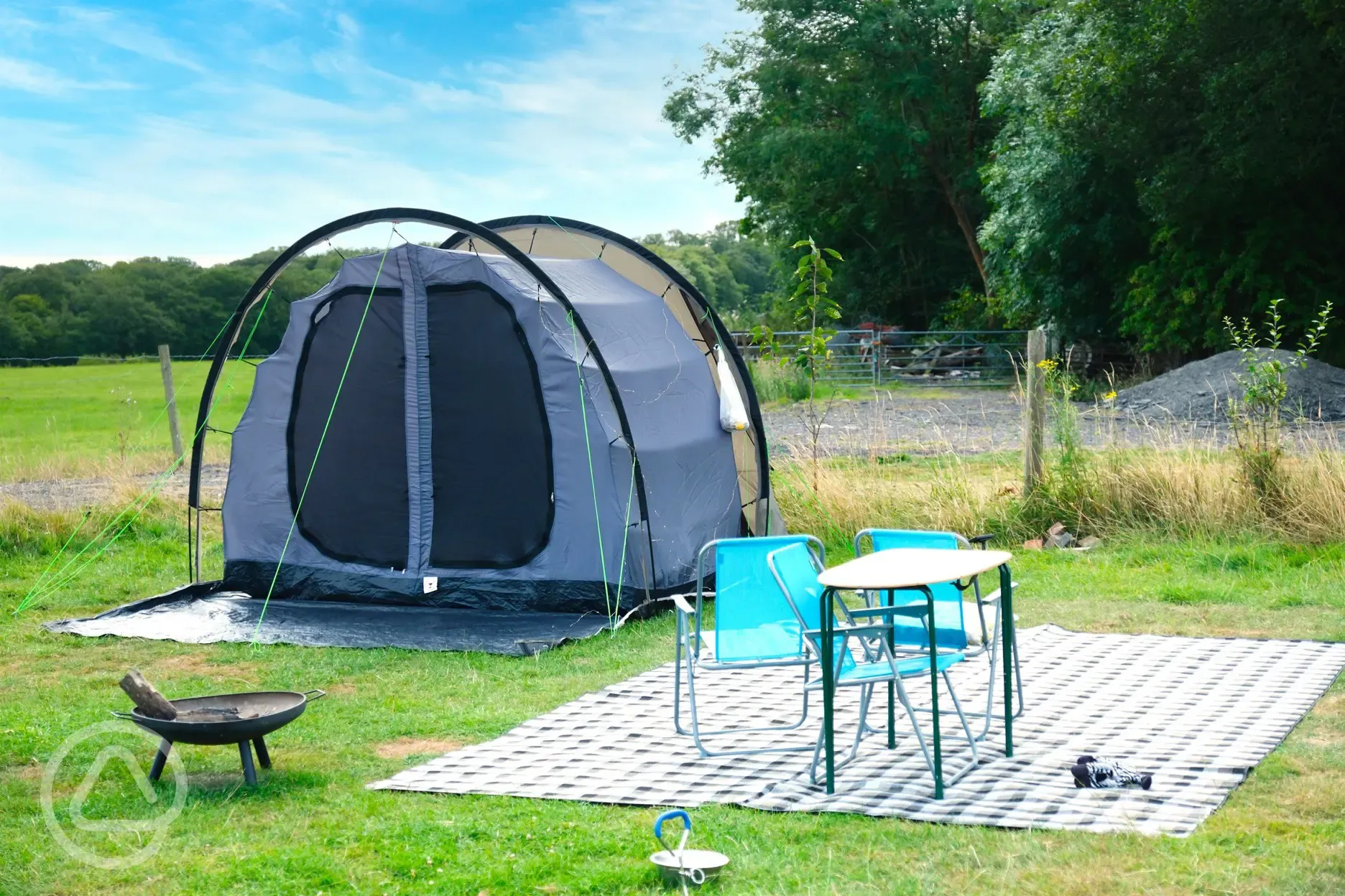 Close up of a tent on an electric grass pitch