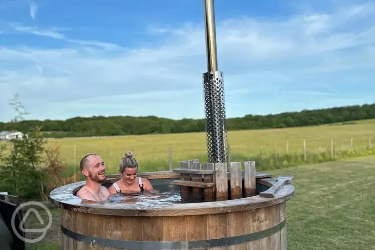 Wellness area's wood-fired hot tub at Brook Farm