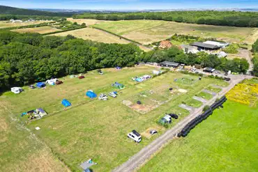 Campsite aerial with far reaching countryside views