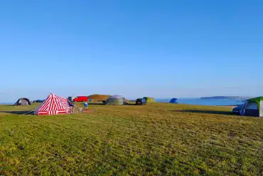 Non electric grass pitches with sea views