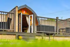 Camping pods with outdoor deck areas