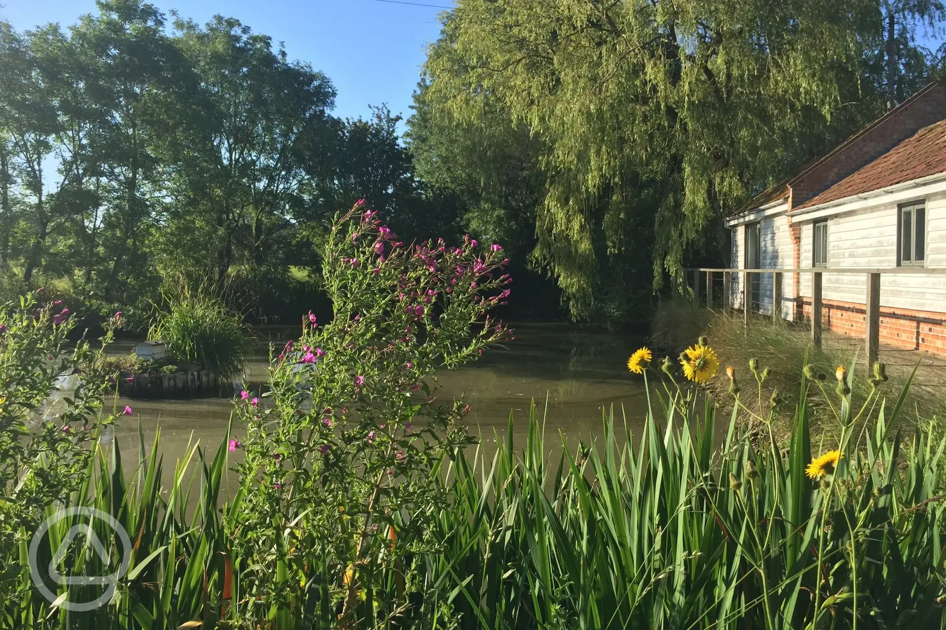 Farm pond on drive entrance.