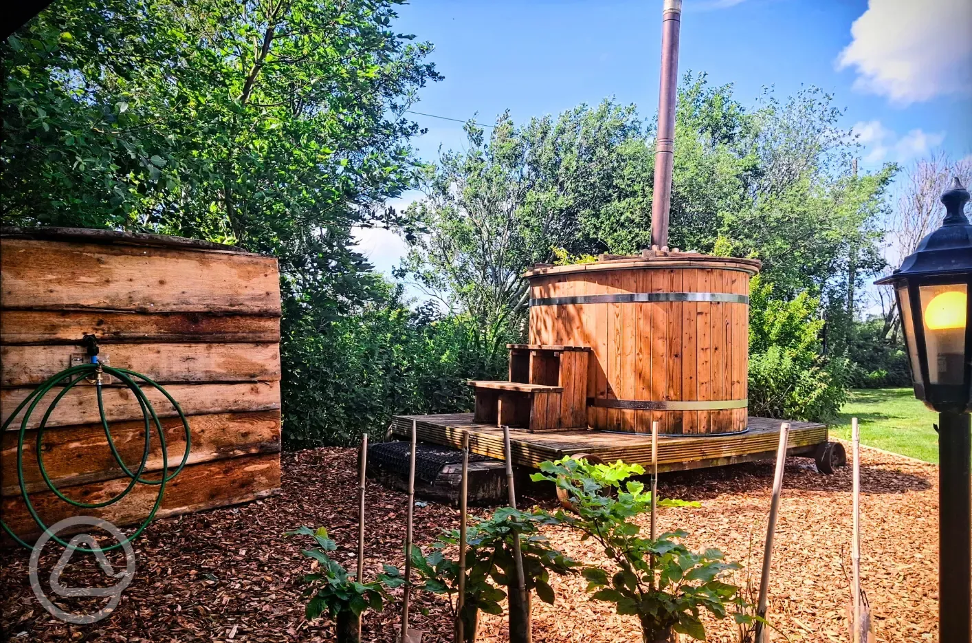 Peacock camping pod with hot tub