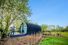 Peacock camping pod and hot tub