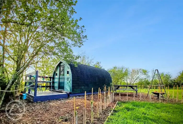Peacock camping pod and hot tub