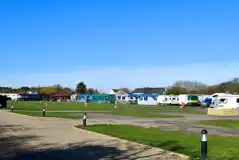 Electric hardstanding and grass pitches