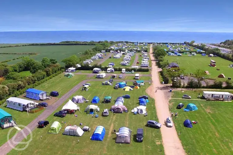 Aerial view of The Hollies Leisure Resort with direct step access to the beach