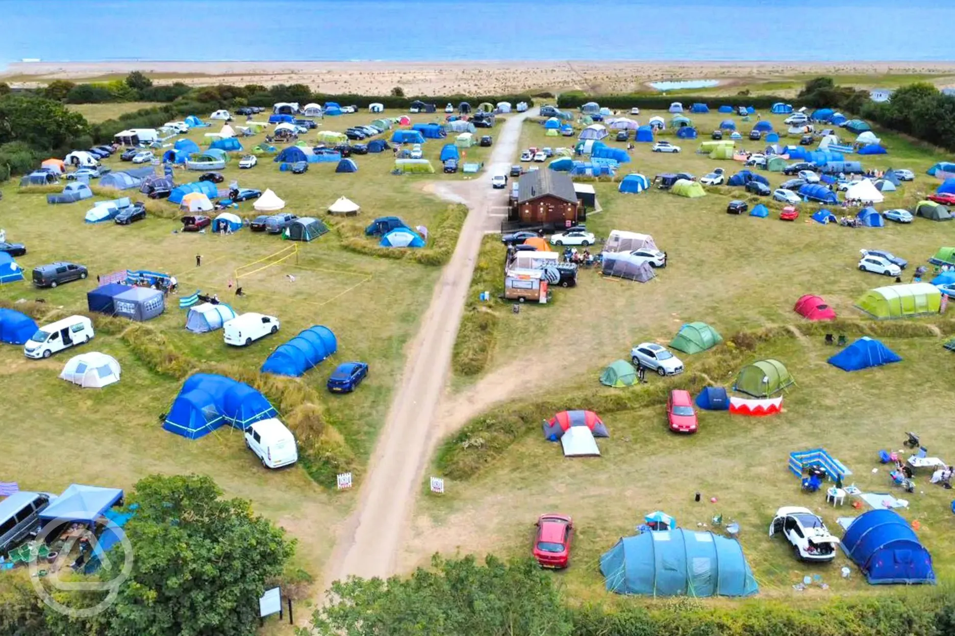 Aerial view of The Hollies Leisure Resort with direct step access to the beach