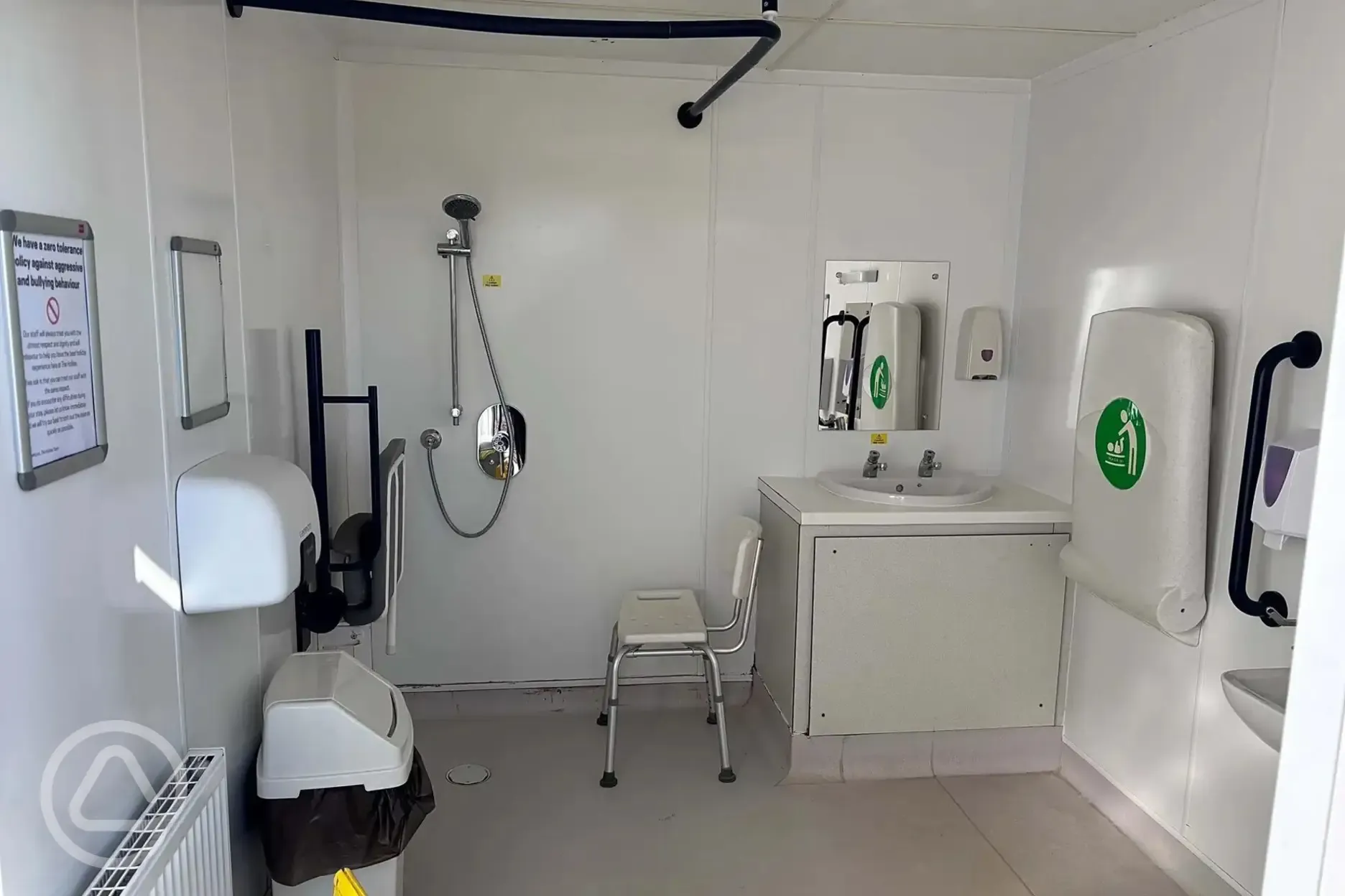 Disabled facilities with seat and handrail, plus baby changing facilities