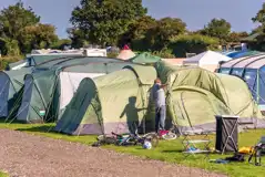 Electric hardstanding and grass pitches