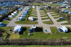 Aerial view of electric hardstanding and grass pitches