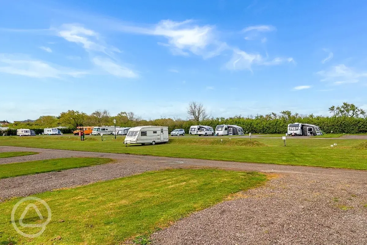 Electric hardstanding and grass pitches, set across four fields