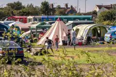 Electric hardstanding and grass pitches