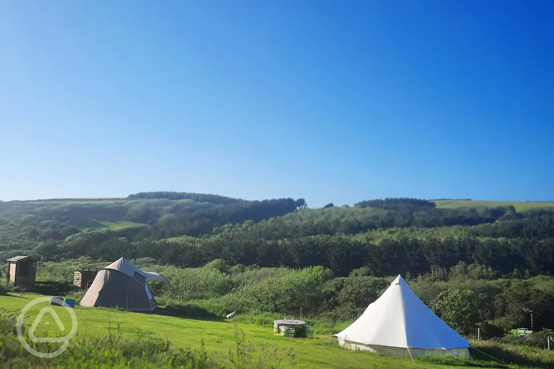 Bell tents and grass pitches