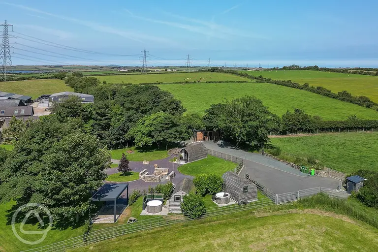 Aerial view of the pods and surrounding countryside at Pods Pwll Coch