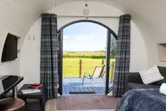 Glamping pod sofa area with a Smart TV