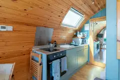 Ensuite glamping pod kitchenette with oven, electric hob and fridge Ensuite glamping pod kitchenette with oven, electric hob and fridge