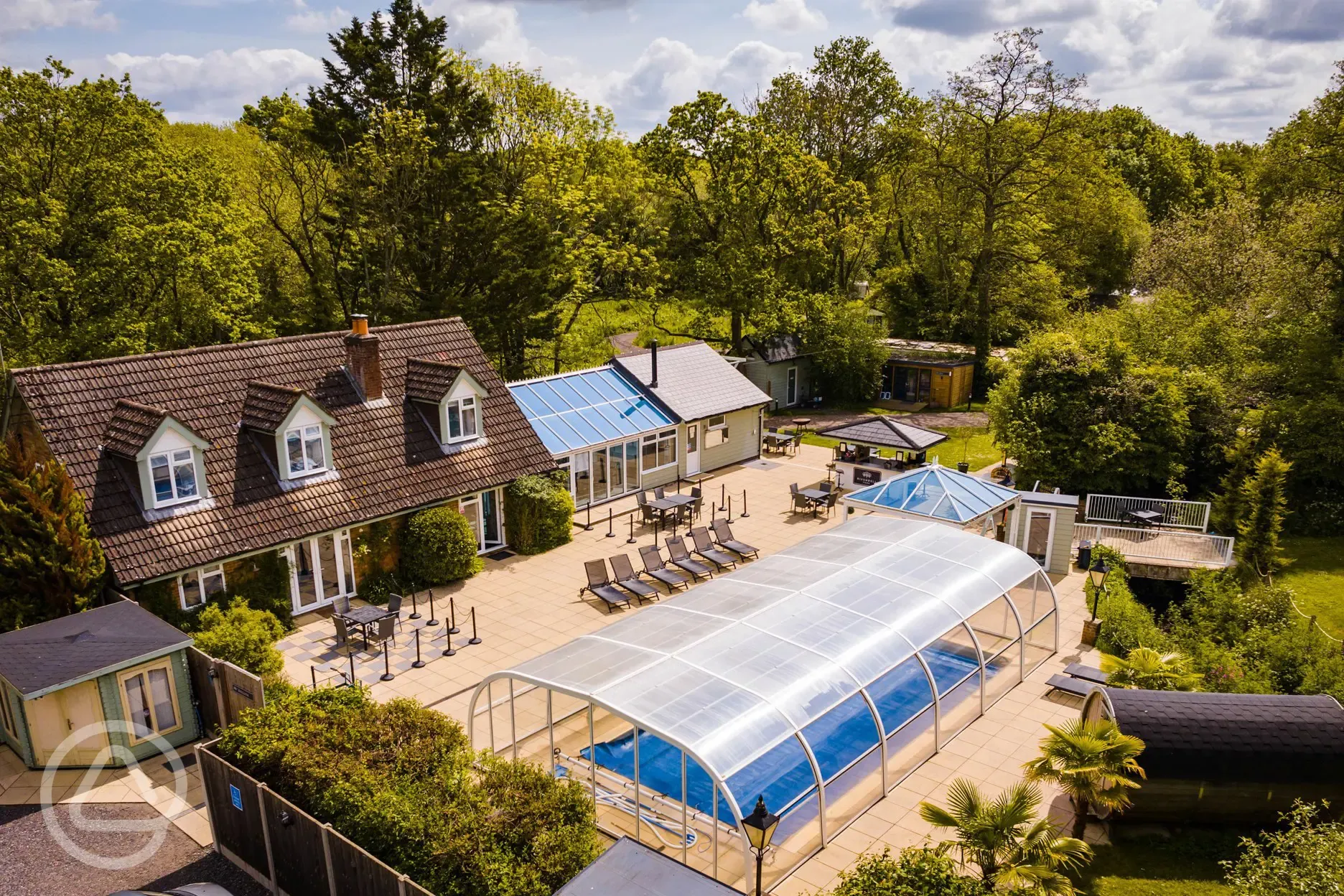 Aerial of the facilities and covered swimming pool