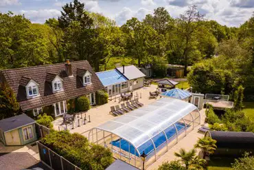 Aerial of the facilities and covered swimming pool
