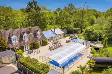 Aerial of the facilities and covered swimming pool and sauna at Rivendell Park