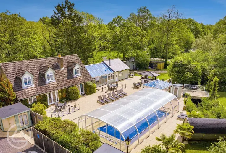 Aerial of the facilities and covered swimming pool and sauna at Rivendell Park