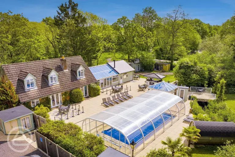 Aerial of the facilities and covered swimming pool and sauna at Rivendell Park