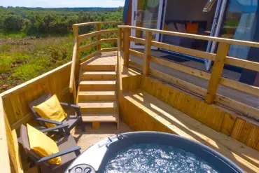 Glamping pod with hot tub