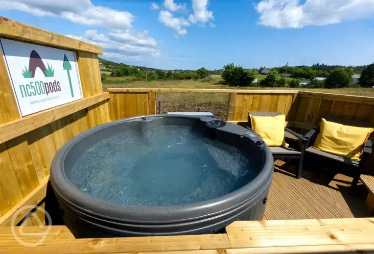 Glamping pod with hot tub