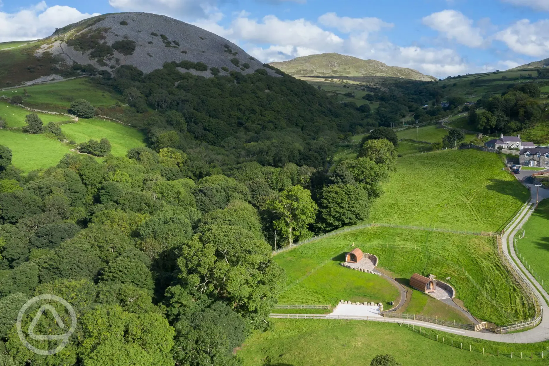 Aerial of the glamping pods and the Carneddau mountains