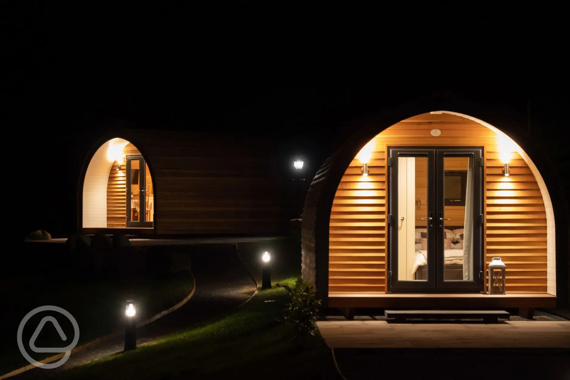 Glamping pods at night time