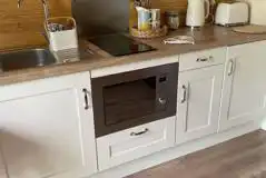 Ensuite glamping pod kitchenette with microwave, kettle and toaster Ensuite glamping pod kitchenette with microwave, kettle and toaster