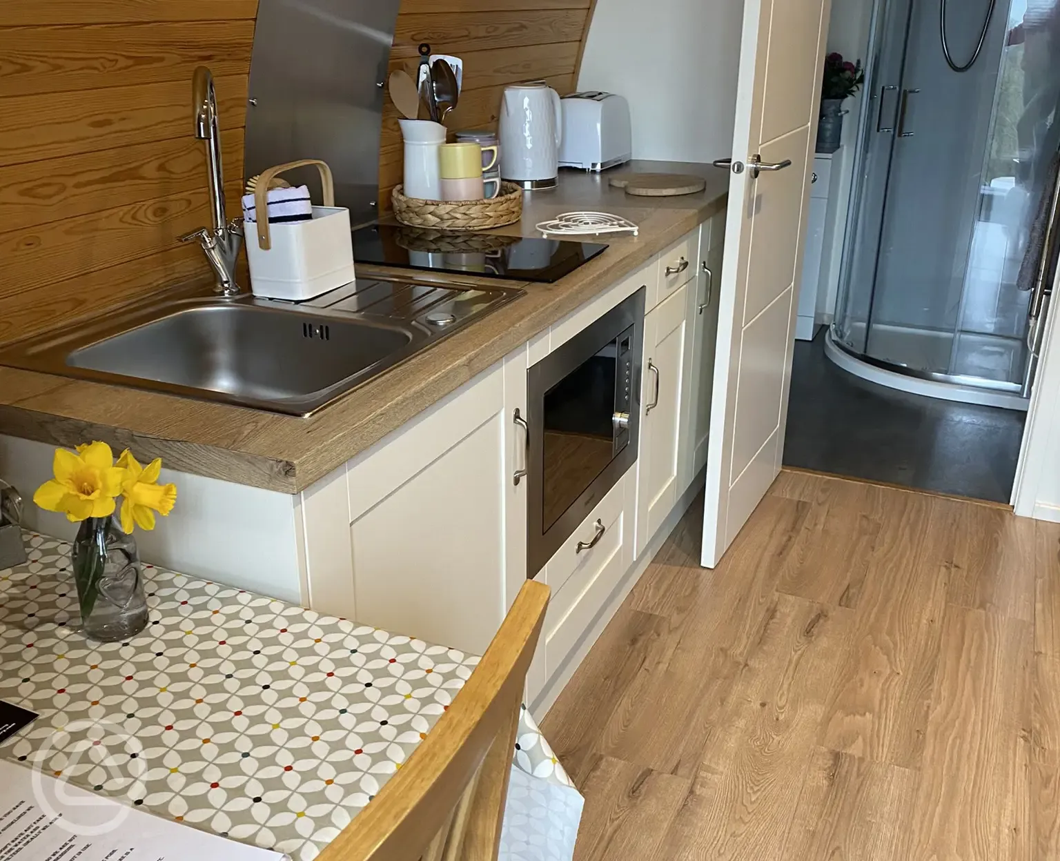 Glamping pod kitchen area and ensuite