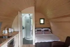 Ensuite glamping pod interior (bedding provided) Ensuite glamping pod interior (bedding provided)
