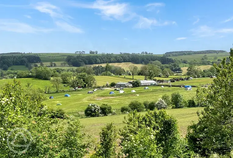 View of the campsite from one of the footpaths in the hills above the farm