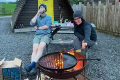 Fire pit outside of the glamping pods