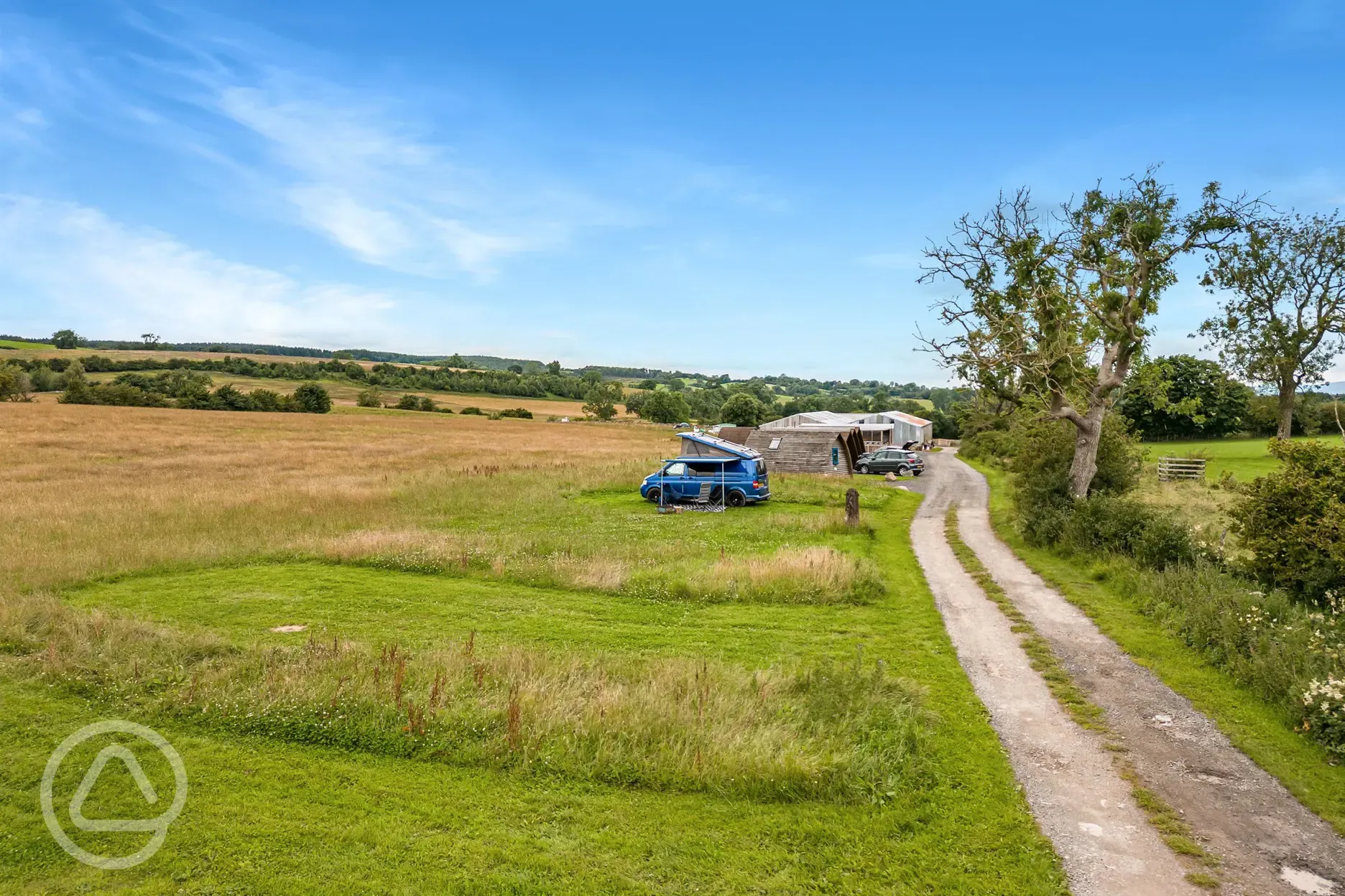 Non electric grass touring pitches with a level track access