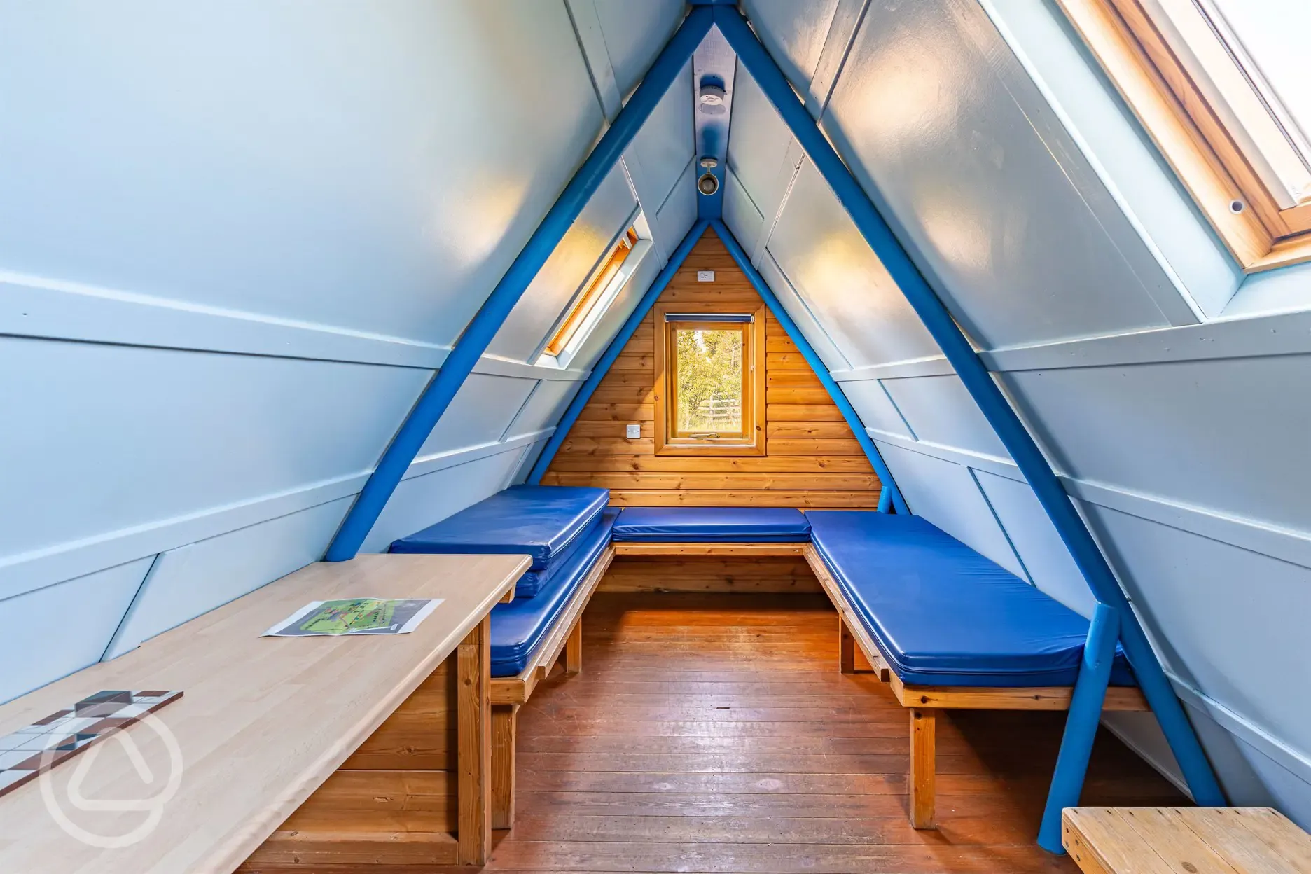 Glamping pod simple interior with room for two adults and two children